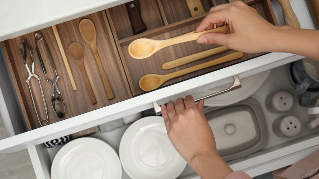 Covenant Cleaning Services Kitchen Organization image of organized kitchen drawers